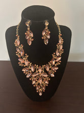Load image into Gallery viewer, Peach Gold Tone Crystal Bib Necklace and Earring Set
